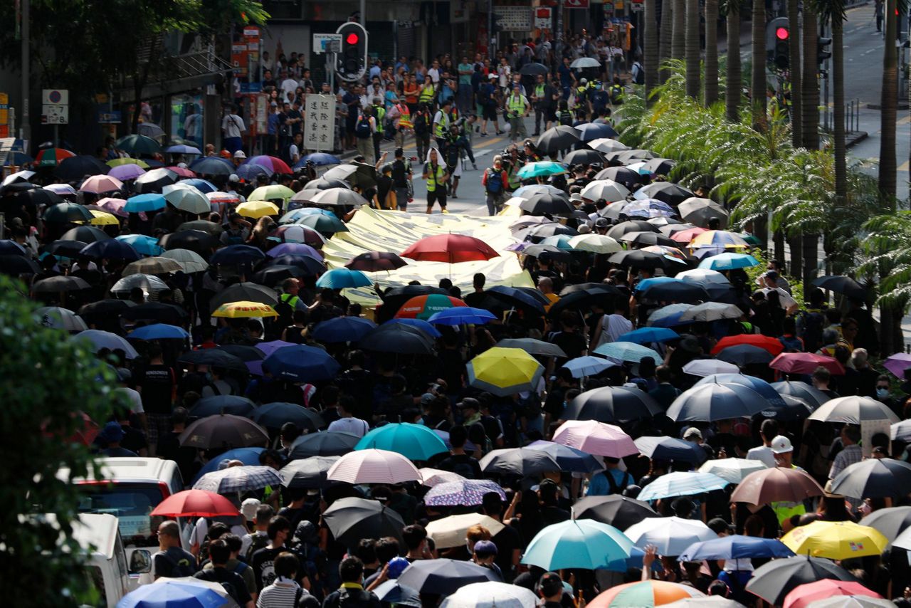 Hong Kong suspends trains, appeals to public after rioting