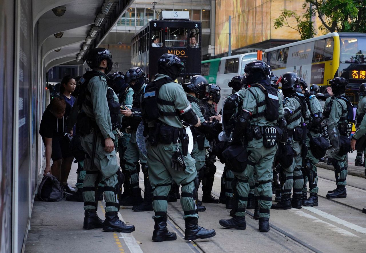 Hong Kong suspends trains, appeals to public after rioting
