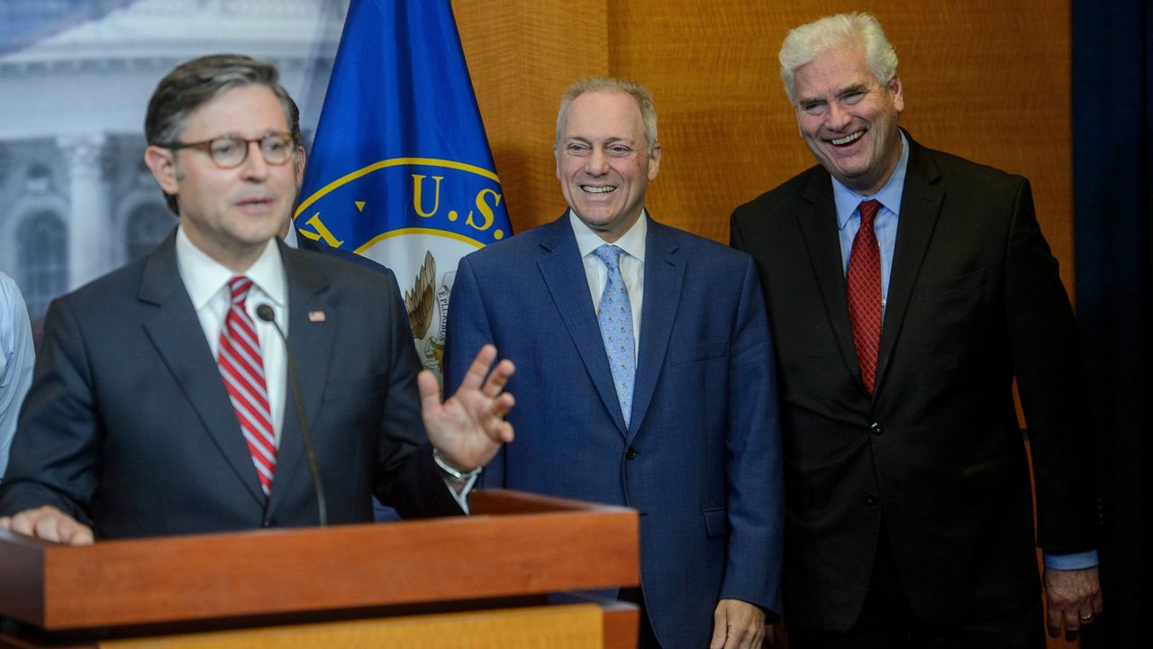House Majority Leader Steve Scalise, R-La., center, and House Majority Whip Tom Emmer, R-Minn., right, listen as Speaker of the House Mike Johnson, R-La., left, speaks during a news conference at the Capitol, Tuesday, May 20, 2025, in Washington. (AP Photo/Rod Lamkey, Jr.)