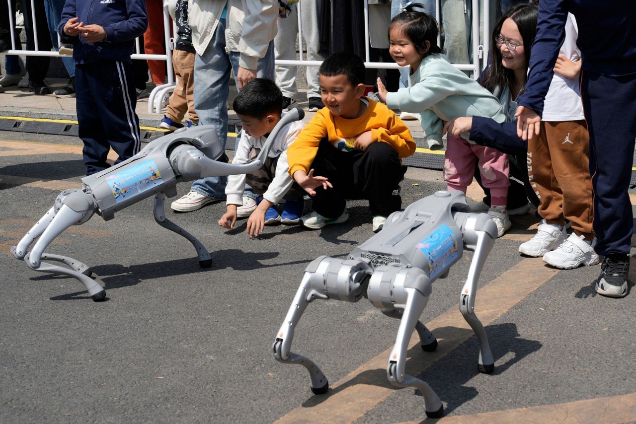 No sweat: Humanoid robots run a Chinese half-marathon alongside flesh ...