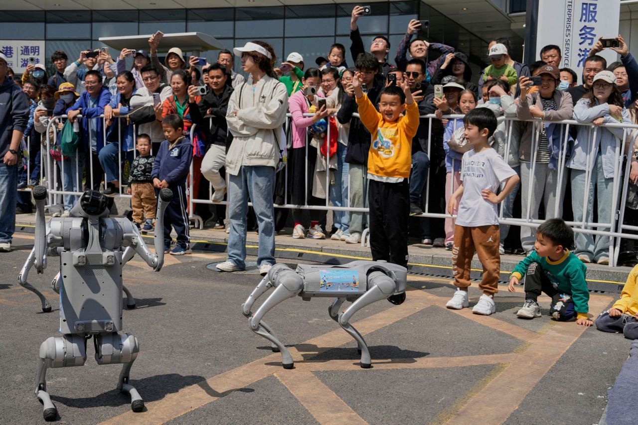 No sweat: Humanoid robots run a Chinese half-marathon alongside flesh ...
