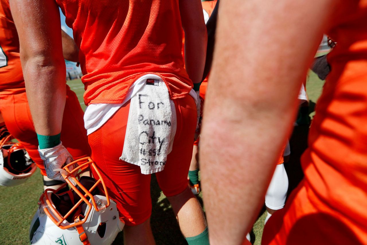 10 days after hurricane, football offers a escape