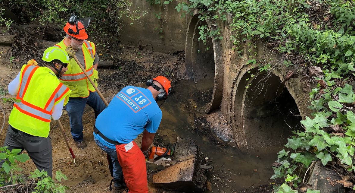 Jahwon Hartsfield (far left) works on one of his first full days as a North Carolina Department of Transportation employee. (Spectrum News 1/Sydney McCoy)