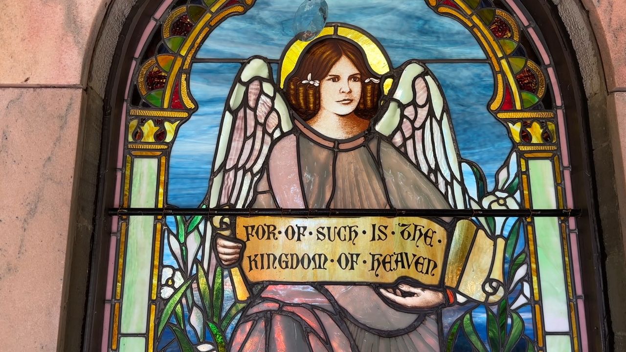 Family research leads to restoring a mausoleum's stained-glass window