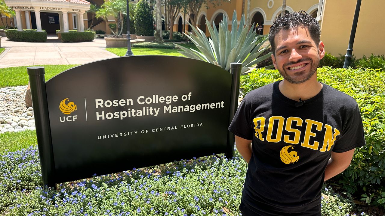 Rosen College of Hospitality Management students Arthur De Paula and John Koprowicz talk about Epic Universe opening May 22. (Spectrum News/Devin Martin)