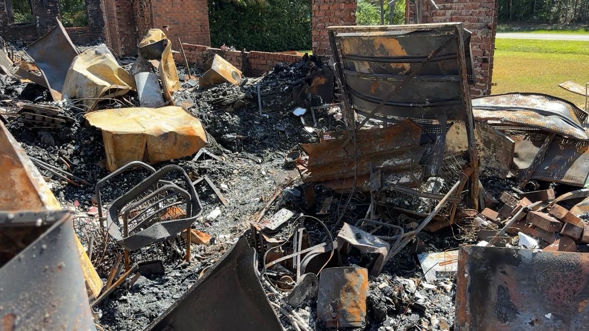 What remains of the Sherwoods home after it burned for two hours in an unnamed summer storm. (Spectrum News 1/Rachel Boyd)