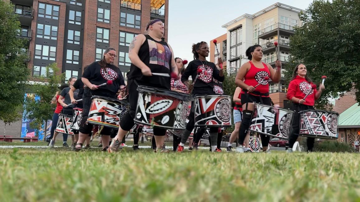 Batalá Durham rehearsing in downtown Durham for an upcoming performance. (Spectrum News 1/Rachel Boyd)