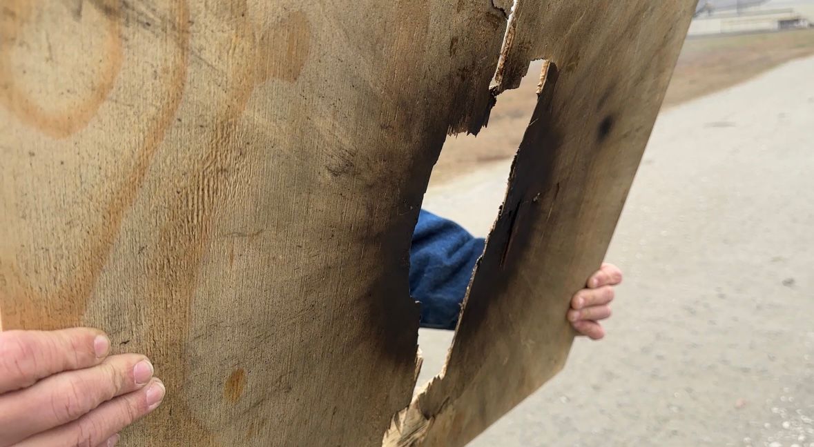 Plywood blown in half by firework.