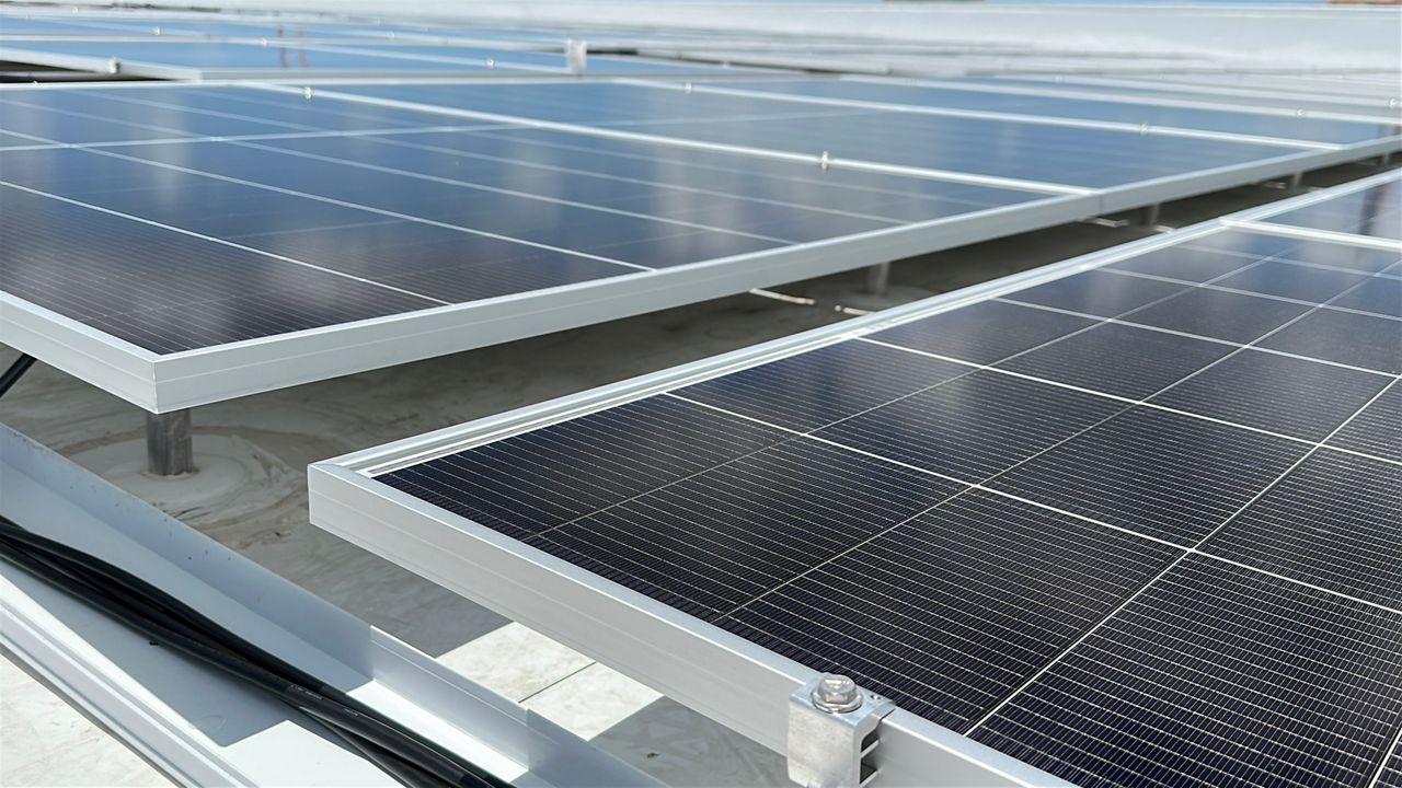 Solar panels are being installed on the roof of the Manatee School for the Arts, which is one of largest solar projects happening right now in Florida, according to the school. (Spectrum Bay News 9/Nick Popham)