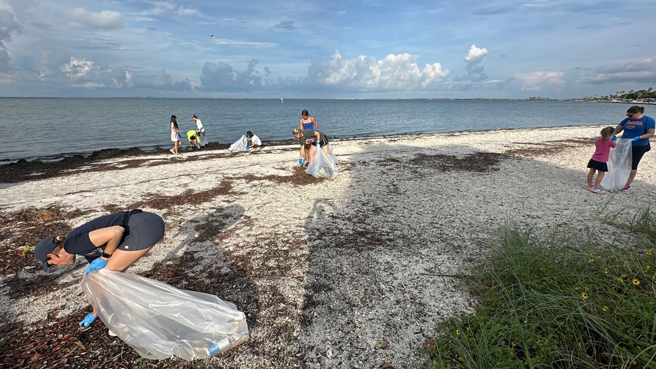 Volunteers take to Ben T. Davis Beach for After the 4th Cleanup