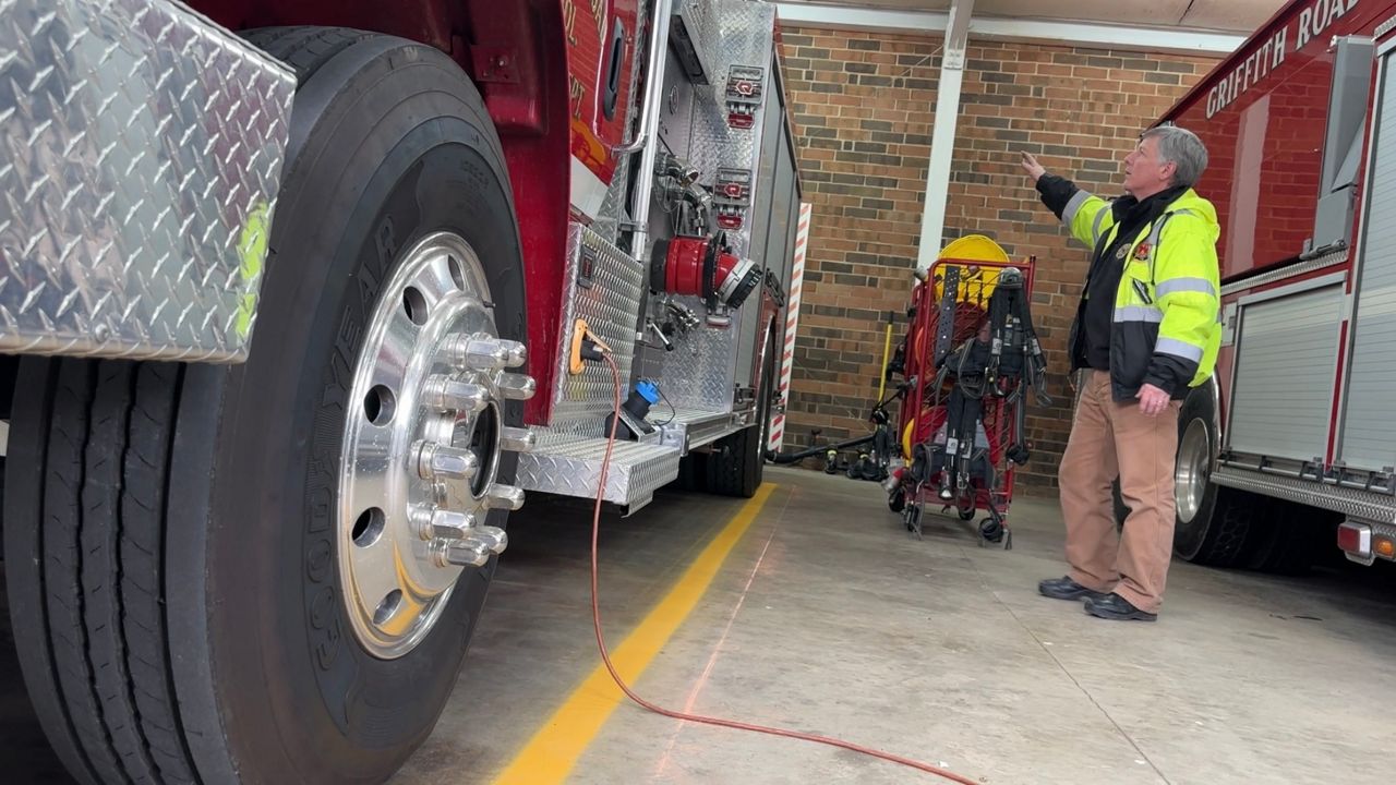 To prepare for extreme weather, Fire Chief Dale Loberger checks all emergency response vehicles and gear. (Spectrum News 1/Rachel Loyd)