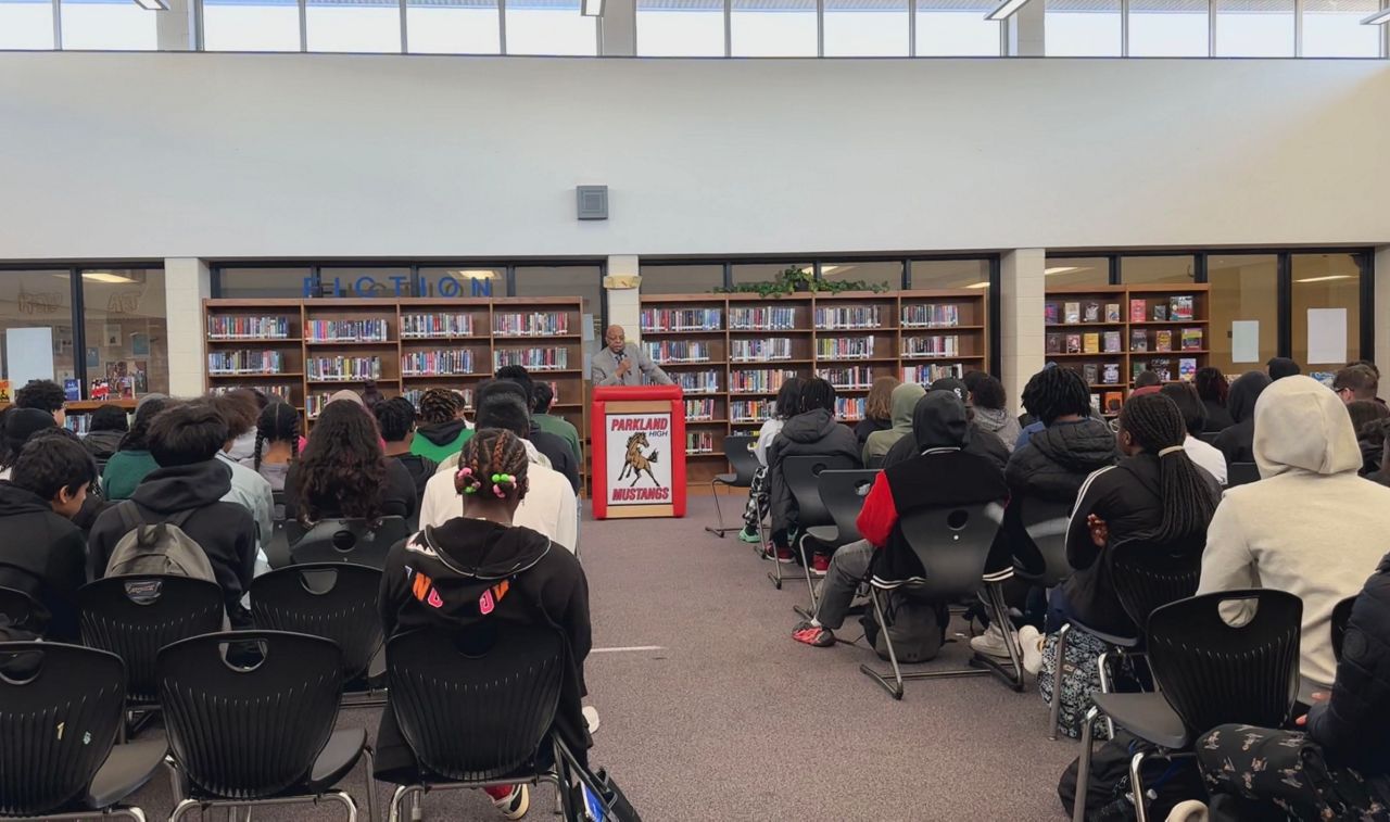 Clarence Henderson speaks at Parkland High School in Winston-Salem. (Spectrum News 1/Sydney McCoy)