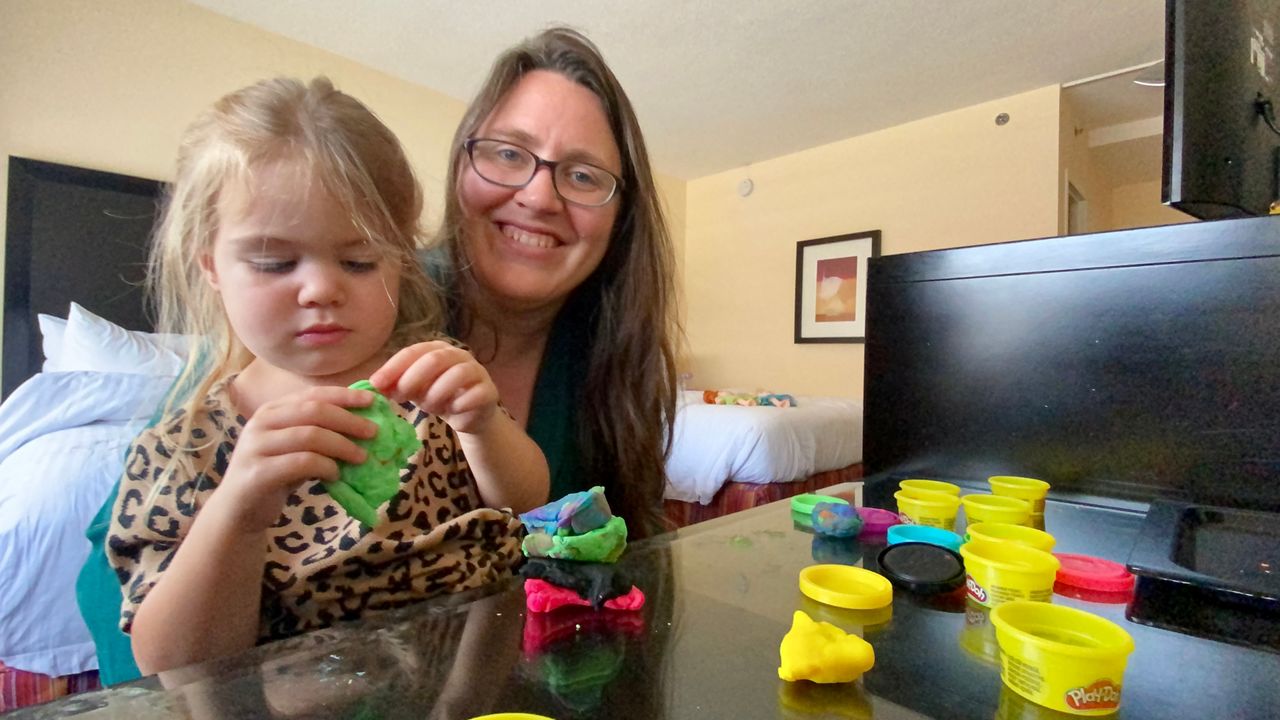 Texas state Rep. Erin Zweiner, D-Driftwood, with daughter Lark. (Spectrum News 1)