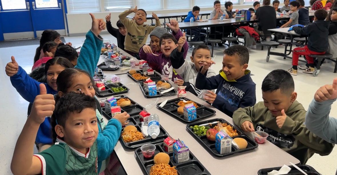 Students giving a thumbs-up after trying the Mood Boost Alert recipe.