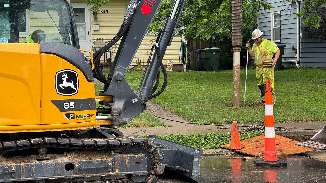 Crews work on replacing lead pipes. 