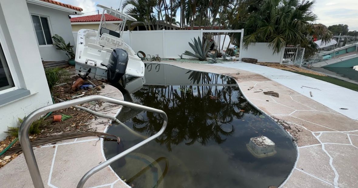 A boat landed in Bob Bernetski's home in Pinellas County. (Spectrum Bay News 9/Lizbeth Gutierrez)