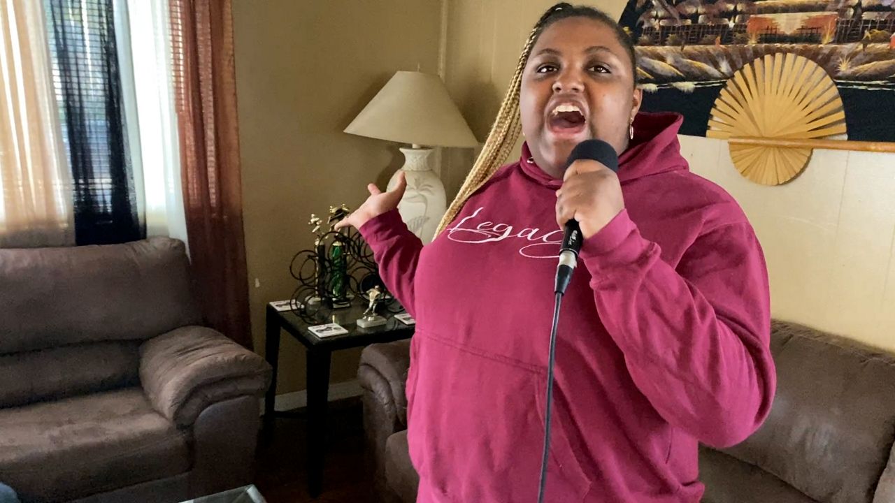 Teen with autism learns the power of music