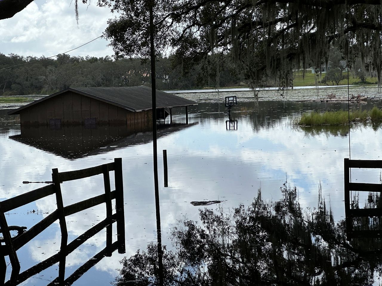 A structure surrounded by water on Miller Drive in Orange City. (Spectrum News/Devin Martin)