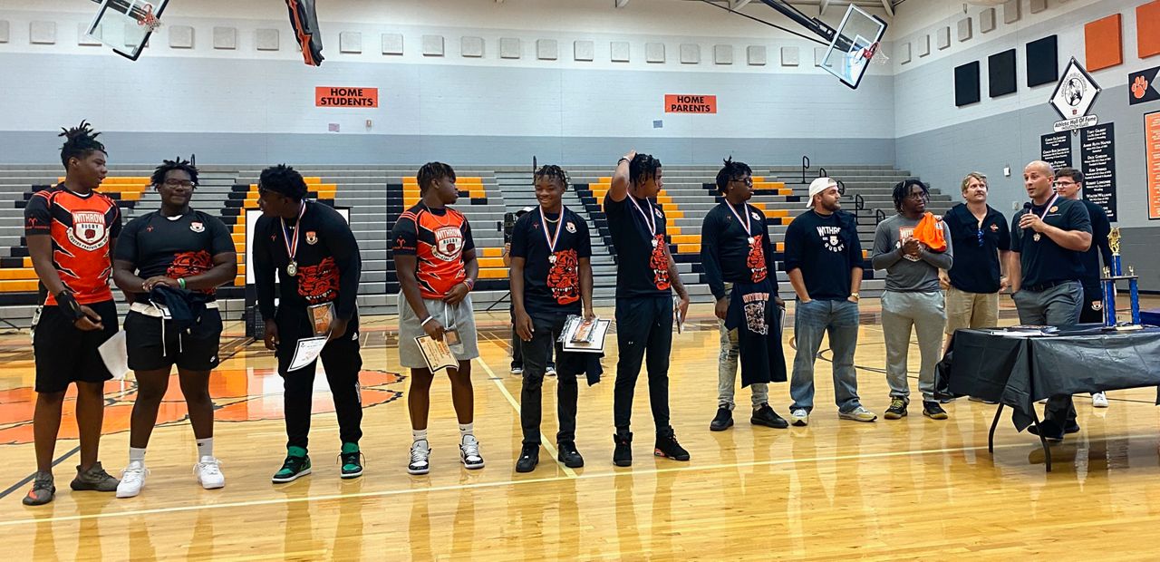 Withrow HS Honors its state champion rugby team with a pep rally