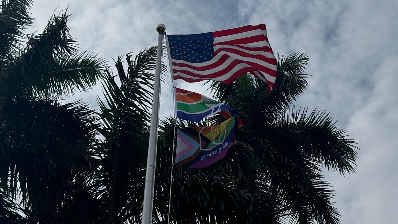 St. Petersburg's new LGBTQ+ liaison participates in raising Pride flag