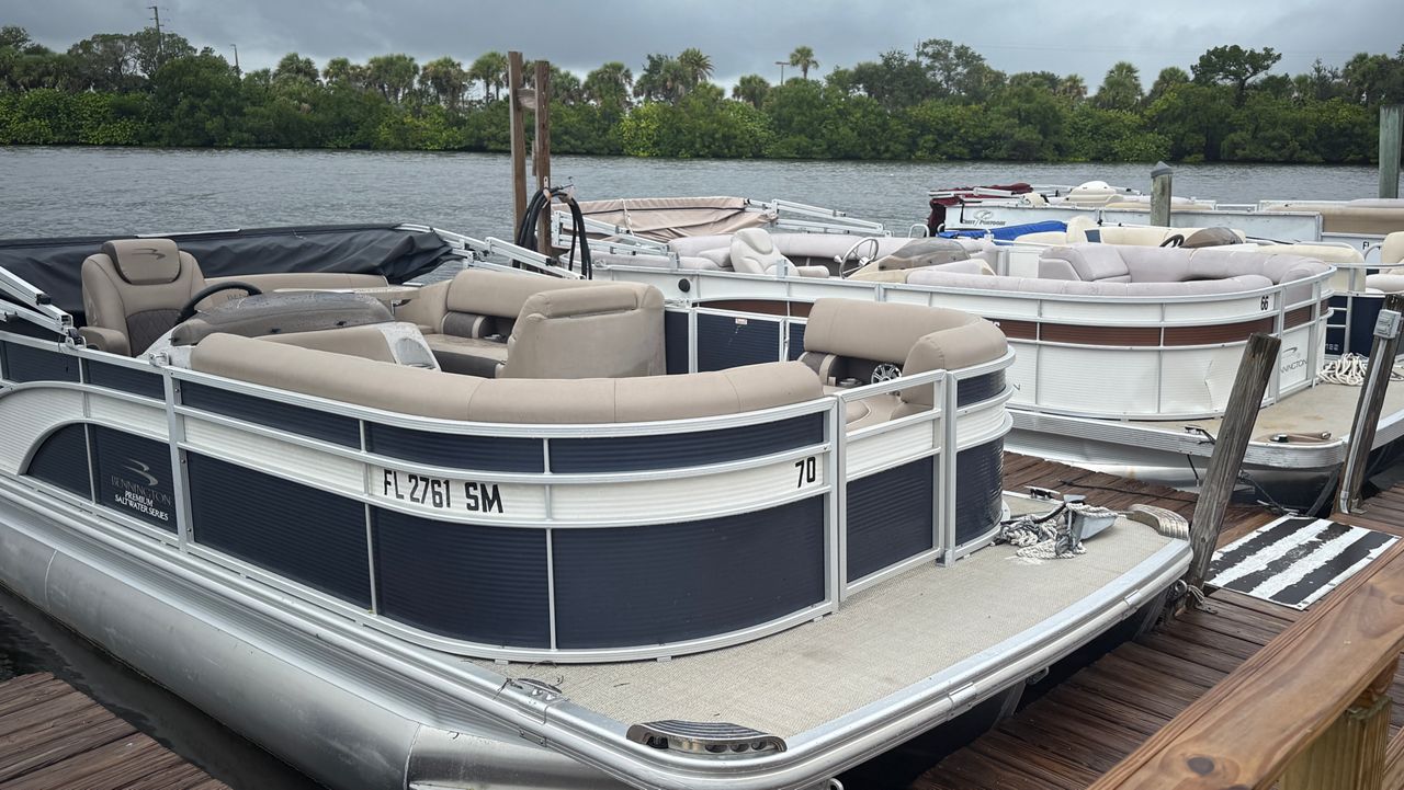 New Smyrna Beach business prepares boats for windy, rainy weather