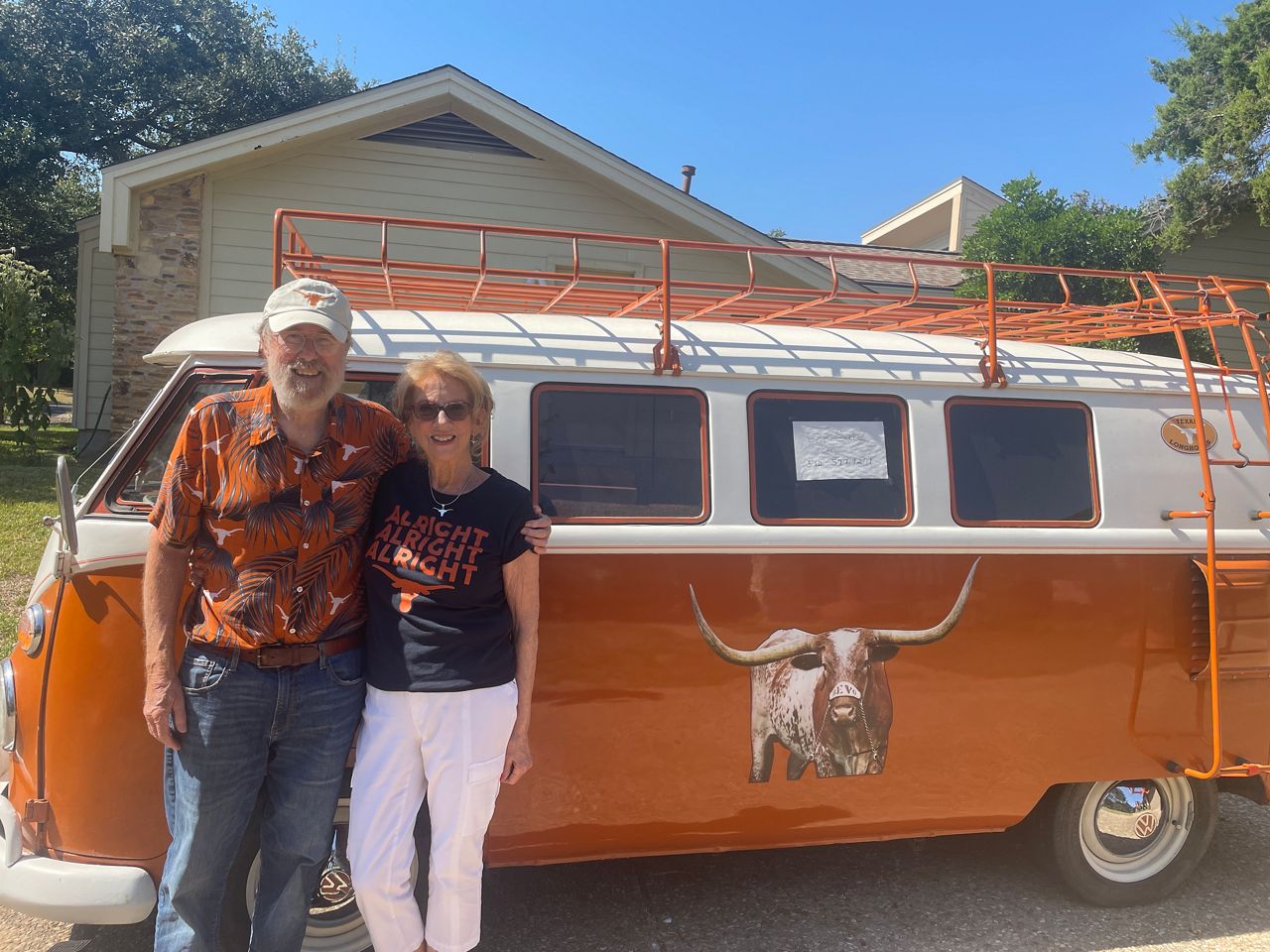 Gene and Sally Schaeffer appear with the Bevo Bus in this image from Oct. 9, 2024. (Spectrum News 1/Tori Garcia)