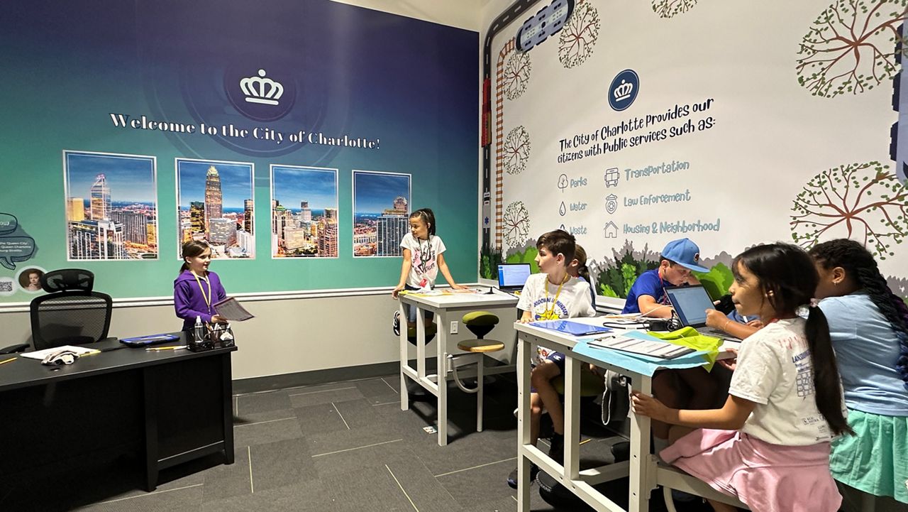 Elementary students learn to manage money through hands-on experience