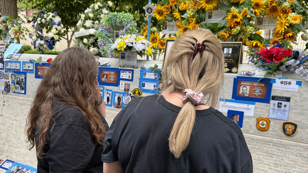 Bridgett Daly and Patty Brenum at the National Law Enforcement Officers Memorial in Washington, D.C. on Monday, May 12. (Spectrum News/Charlotte Scott)