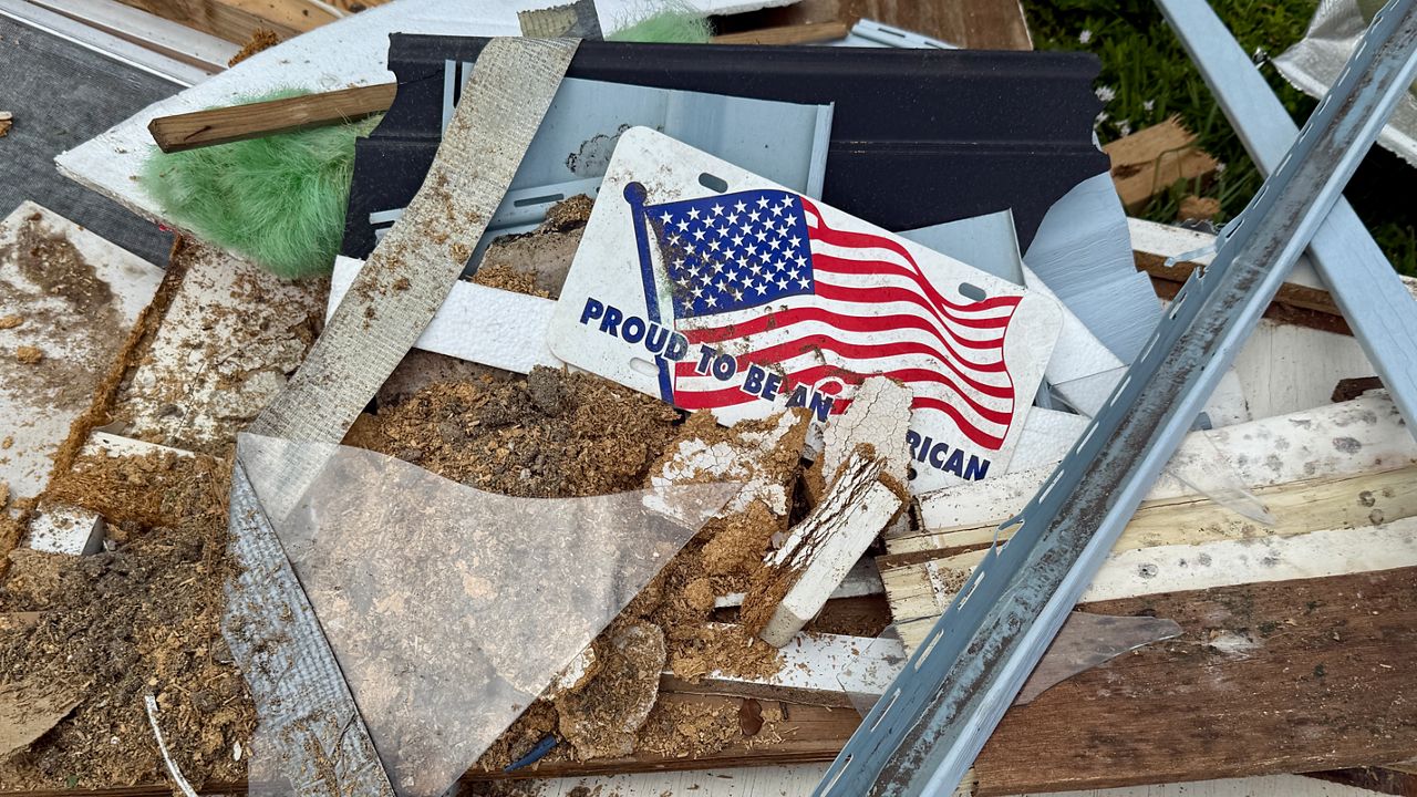 Debris still scattered in Largo Mobile Home Park after an EF-1 tornado hit on June 25. (Spectrum News)