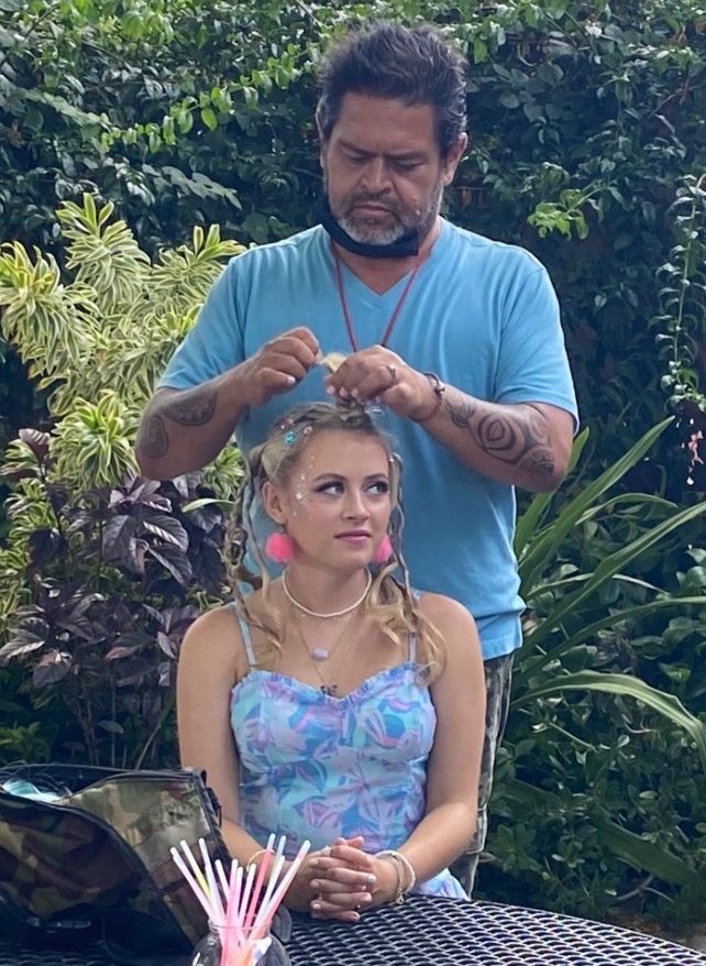 Ralph Malani on the set of "Doogie Kameāloha, M.D." styling Emma Meisel, who plays Steph Denisco on the show. (Photo courtesy of Ralph Malani)