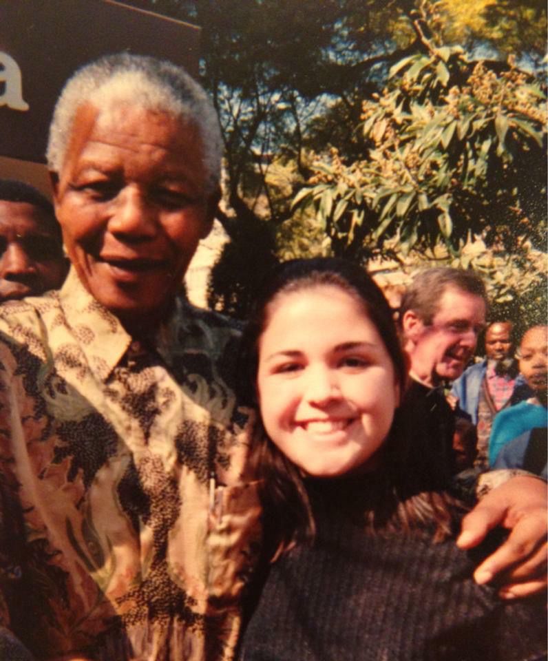 Nineteen-year-old Ana Hernandez poses with Nelson Mandela when she was in South Africa for the Peace Corps. (photo credit: Rep. Ana Hernandez)