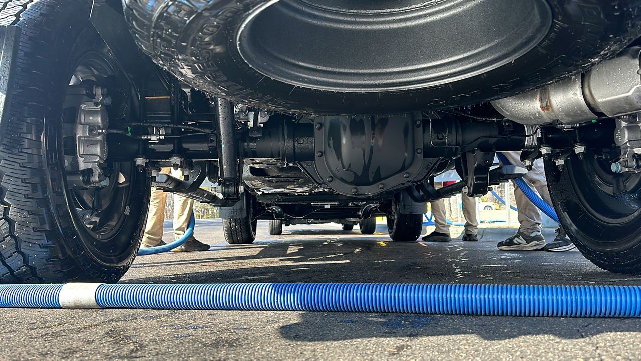 You can clean the bottom of your vehicle yourself or take it to a car wash to get of the rid of the salt brine. (Spectrum News 1/Patrick Thomas)
