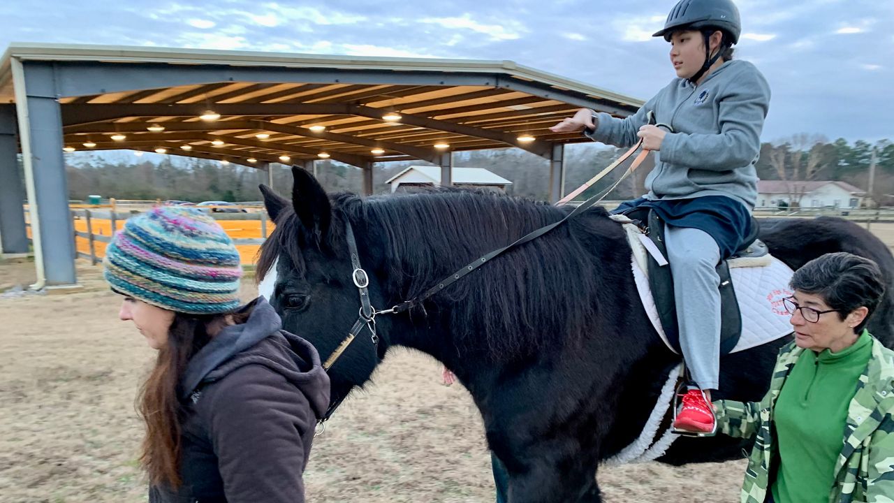 Children with autism find happiness in horseback riding