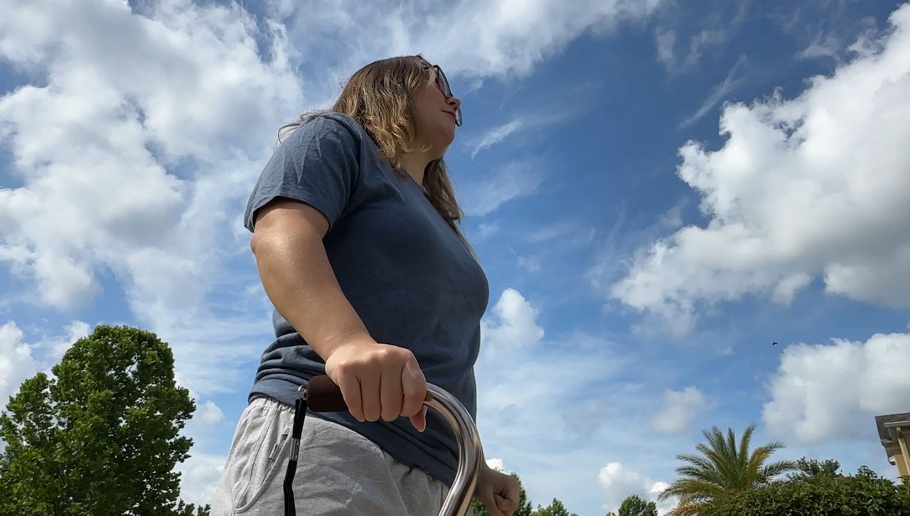 Florida State University shooting survivor Madison Askins is using a cane to help her walk. The bullet hit her L5 vertebrae (Anthony Sande/Bay News 9). 