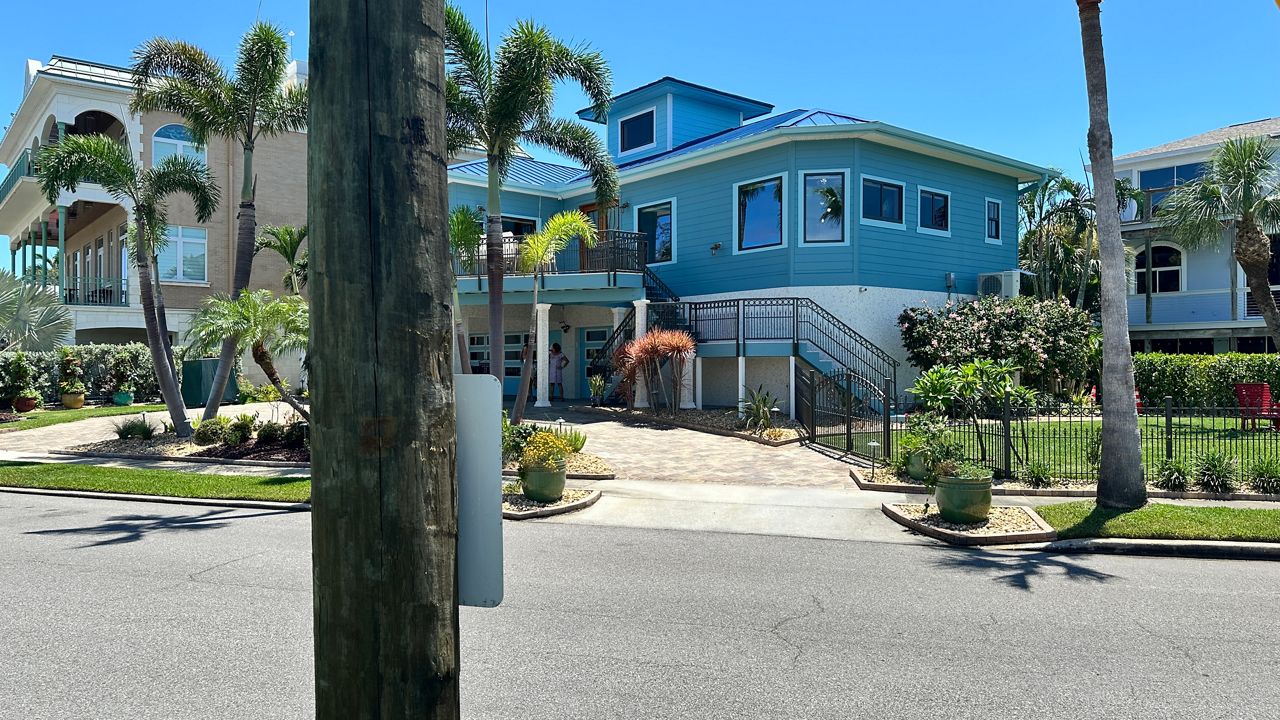 A large pole for 5G equipment has been installed 25 feet from a St. Pete Beach resident's property in an historic neighborhood (Spectrum News/Josh Rojas).