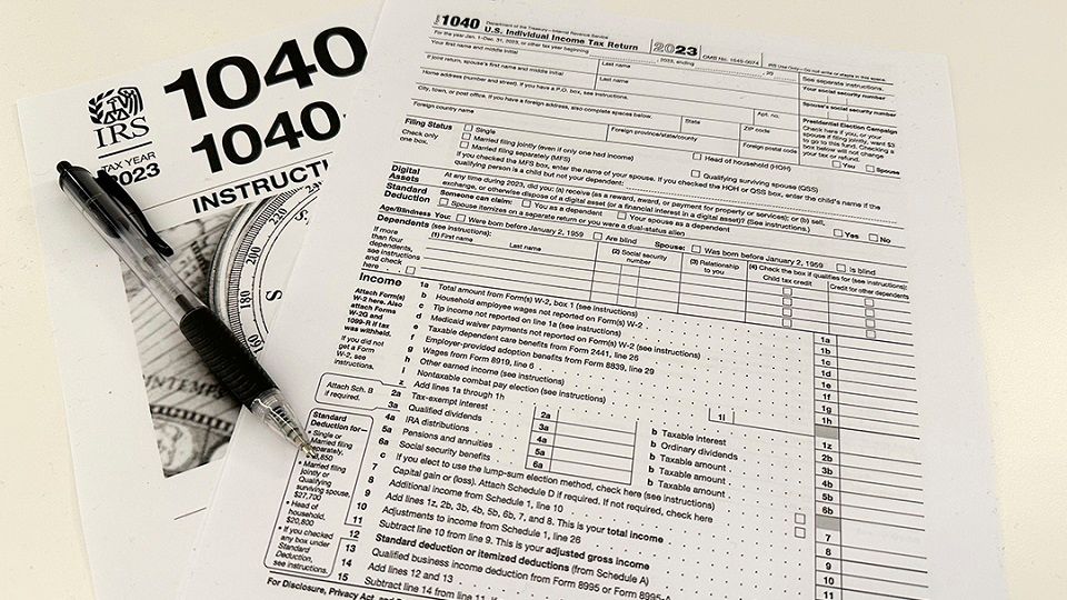 An IRS 1040 tax form. (AP Photo/Peter Morgan, File)