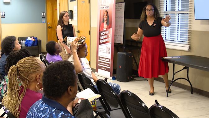 Orlando City Commissioner Shan Rose speaks to more than a dozen community members from Ivey Lane and Malibu Grove as they discuss the next steps for affordable housing complex Ivey Flats. (Spectrum News 13/Brandon Spencer)