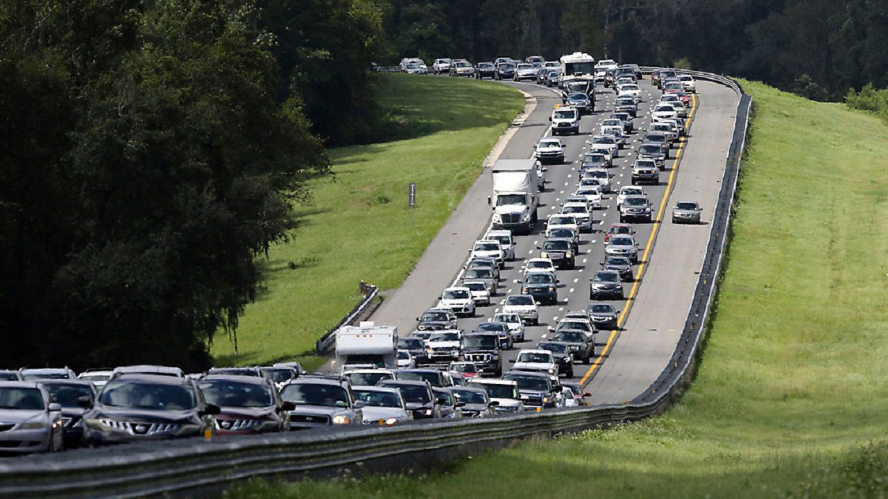 In Tampa, AAA says the worst time to travel by car is between noon and 6 p.m. On Thursday, May 29 and between noon and 7 p.m. On Friday, the 23rd.  (AP Photo/Gerald Herbert)