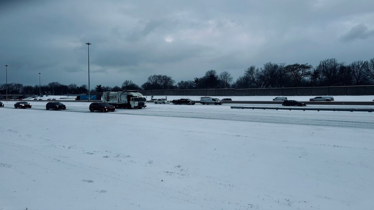 Snow coated I-90 Tuesday morning. (Spectrum News 1/Cierra Campbell)