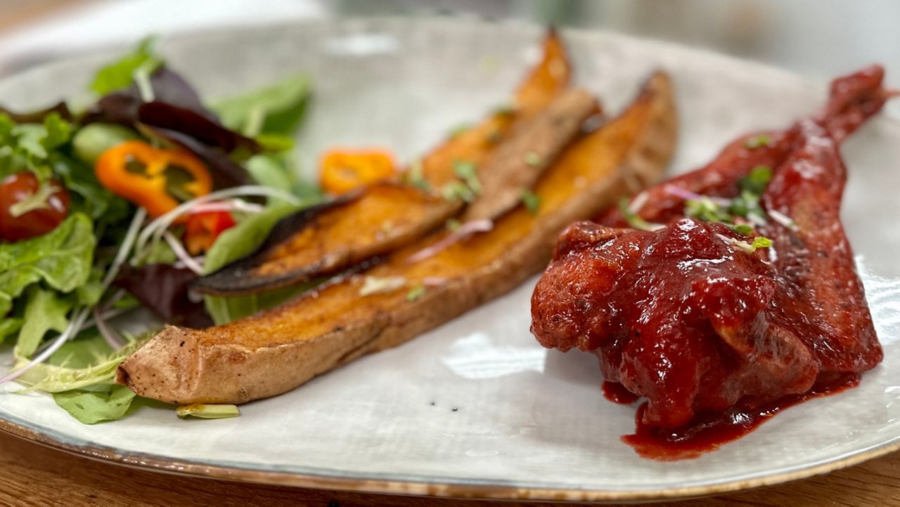 Prickly pear fruit spicy barbecue sauce glazed fried quail from Barbara's Kitchen in Largo. (Spectrum News/Bobby Collins)