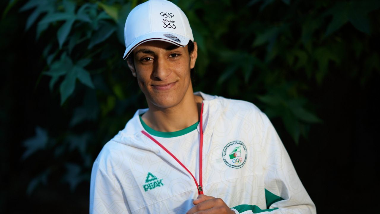 Algerian boxer Imane Khelif poses for a photo after an interview with SNTV at the 2024 Summer Olympics, Sunday, Aug. 4, 2024, in Paris, France. (AP Photo/Vadim Ghirda)