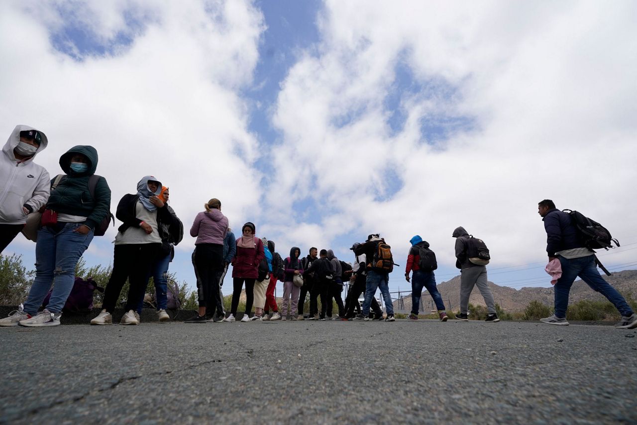 US to limit asylum at Mexico border, open 100 migration hubs