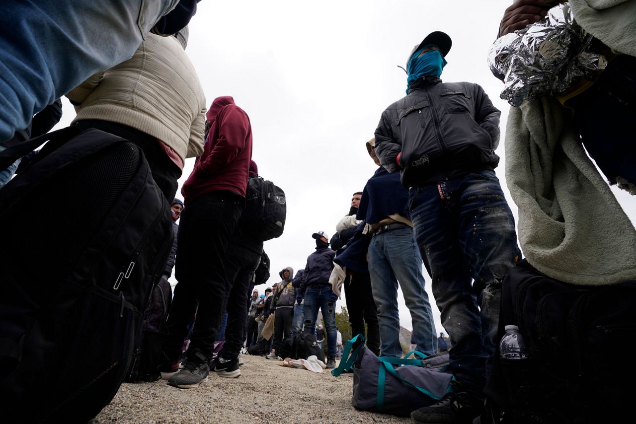US to limit asylum at Mexico border, open 100 migration hubs