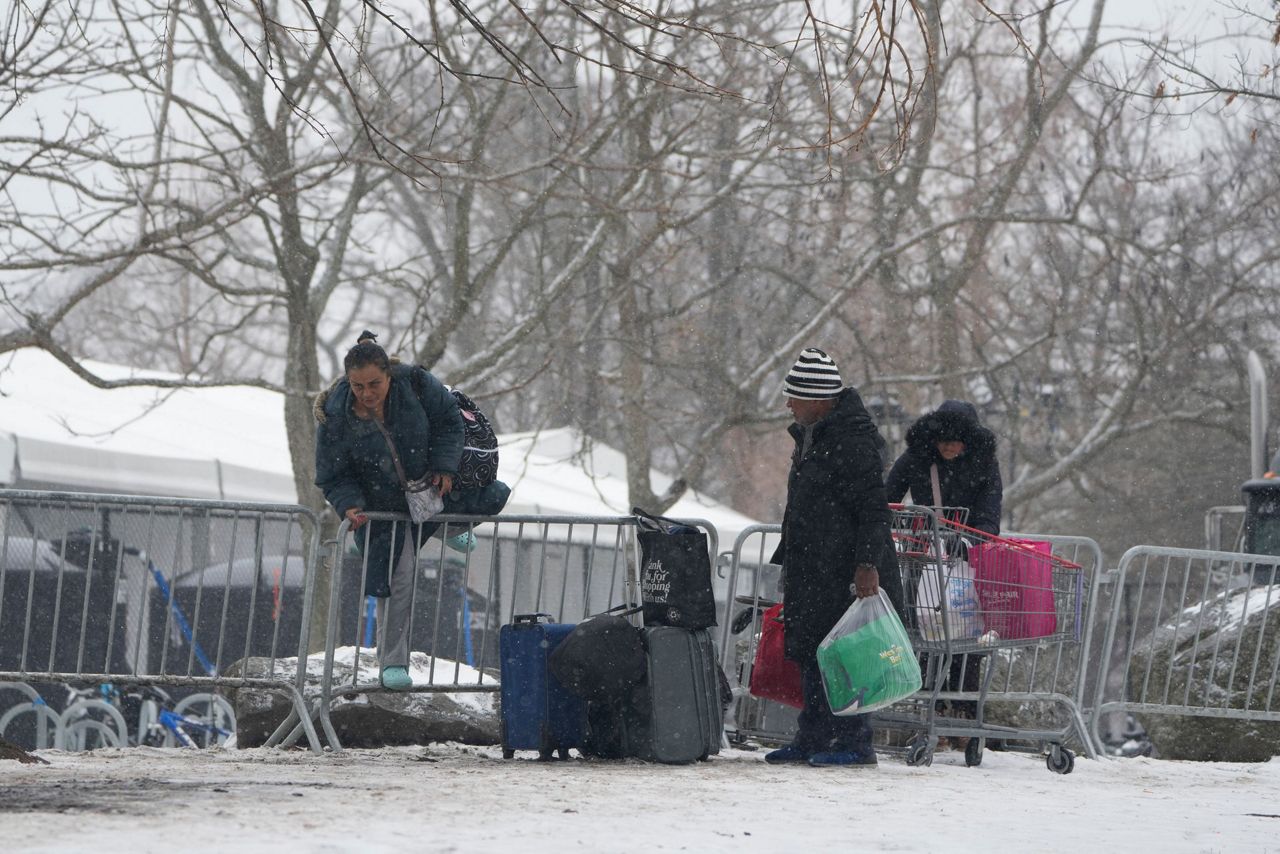 With beds scarce and winter bearing down, a tent camp grows outside NYC's largest migrant shelter