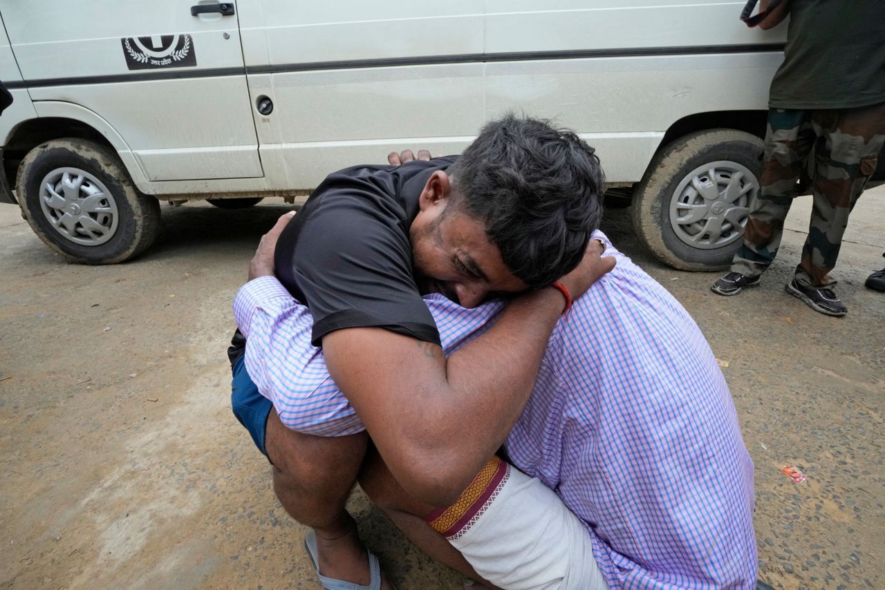 How did a religious gathering in India turn into a deadly stampede?