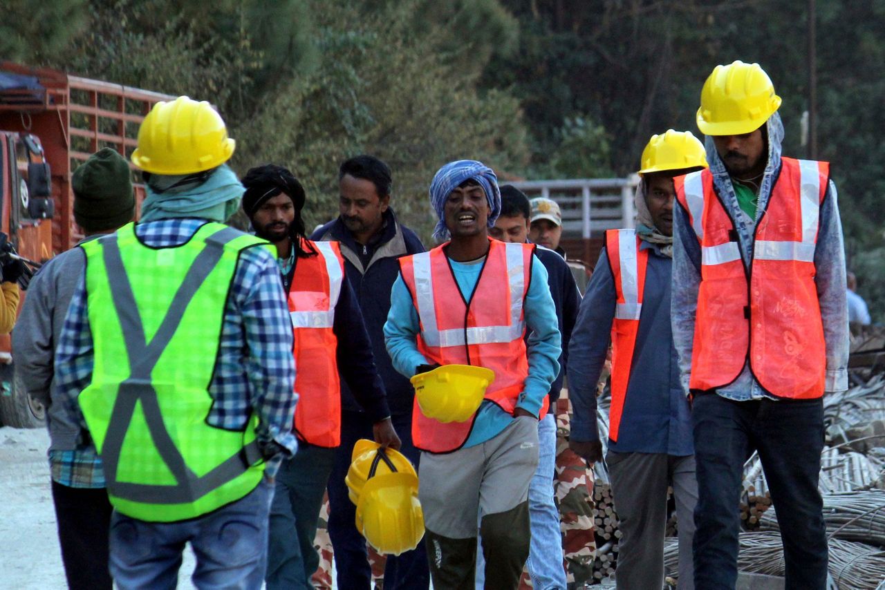 In India, 40 workers are trapped in a tunnel for a 7th day as rescuers ...