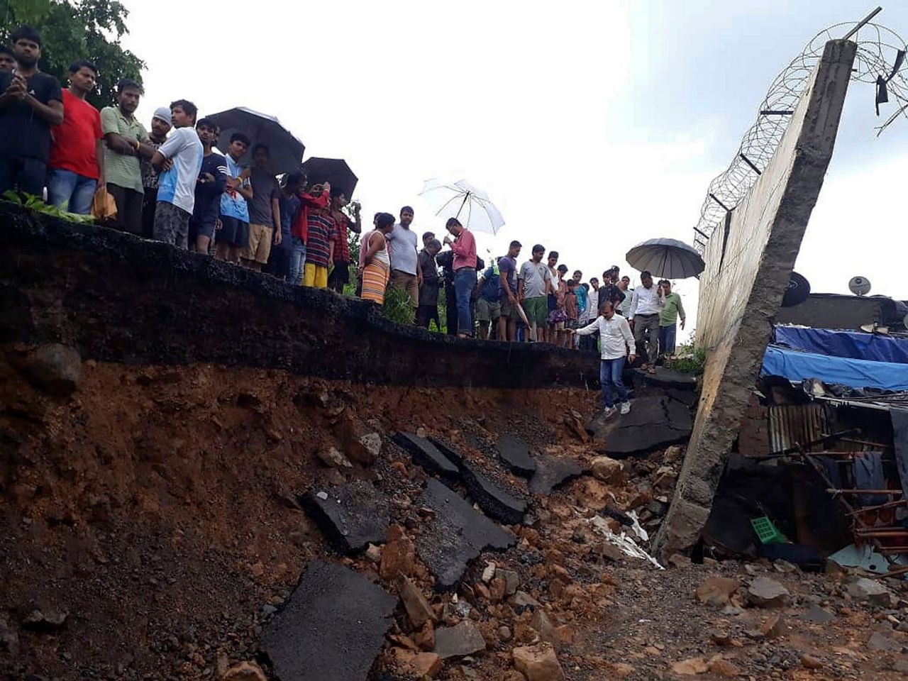 Rain causes wall collapse in India, killing 15 people