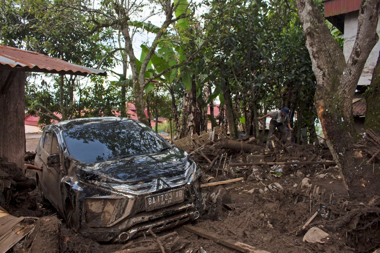 More bodies found in Indonesia after flash floods killed dozens and ...