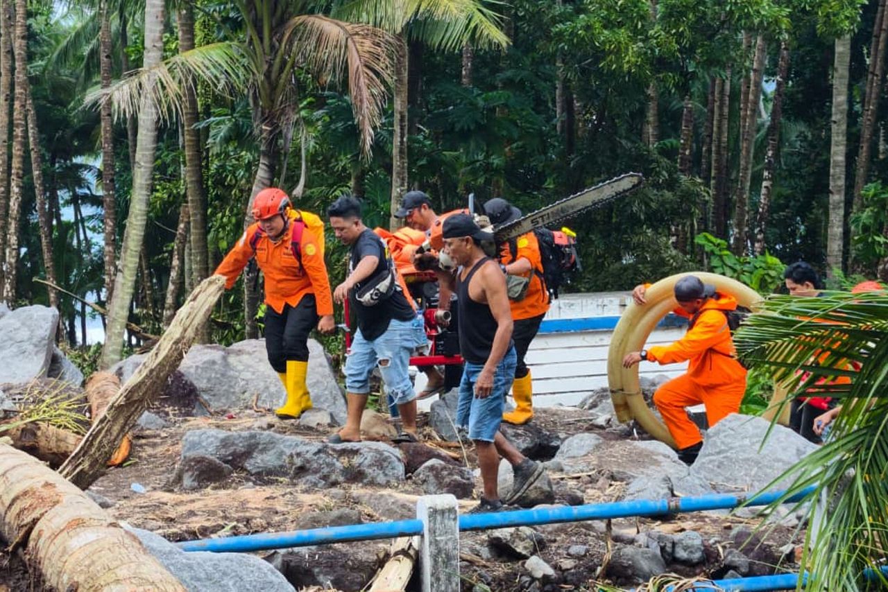Flash floods in Indonesia kill at least 16 people and sweep away homes
