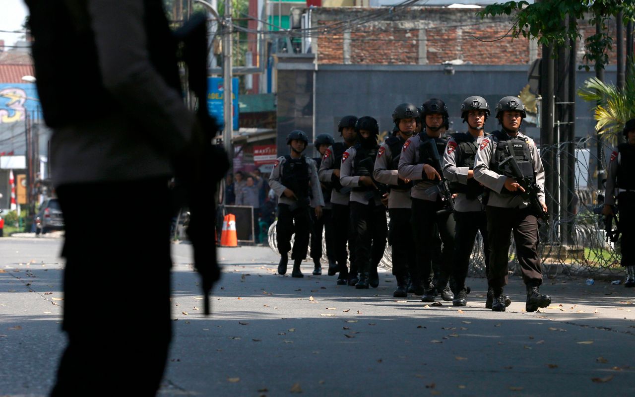 The Latest: 6 killed in Indonesia prison riot